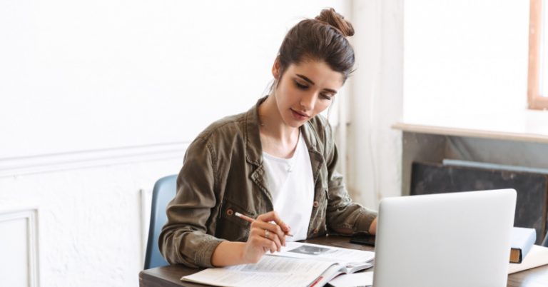 Medical student using tips on how to increase your productivity studying from home